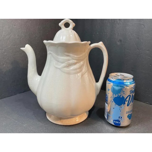 Antique White Ironstone Coffee Pot or Tea Pot in Wheat pattern; measuring approximately 10 1/2" high x 6" wide x 9" from...