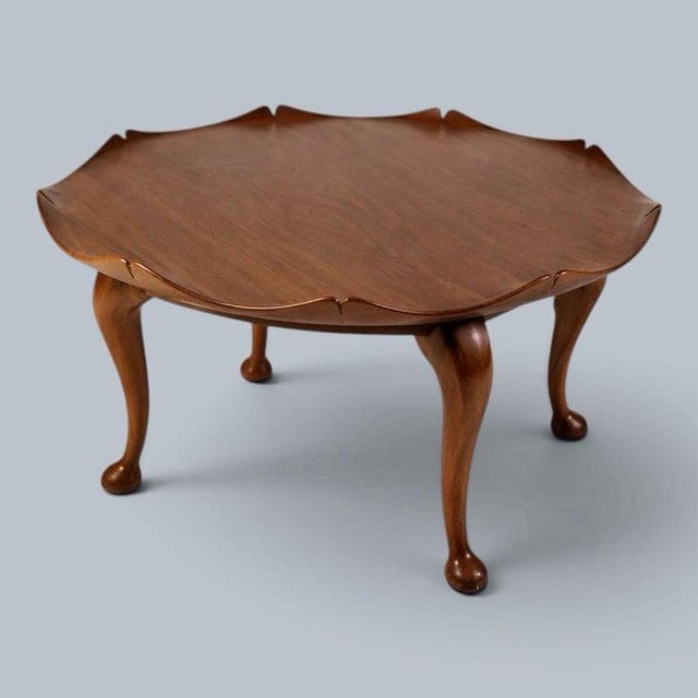 wonderfully unusual 1970s solid teak coffee table, defined by its sculptural, organic form and distinctive lotus-inspired...