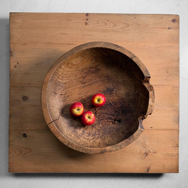 Hand-carved Japanese dough bowl (kibachi) from the 1920s, made from a single solid piece of wood. The bowl has a broad,...