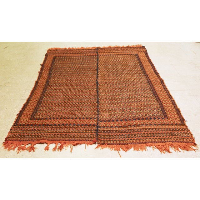 Vintage Persian Shiraz hand woven tribal kilim with natural colors and fine weave.