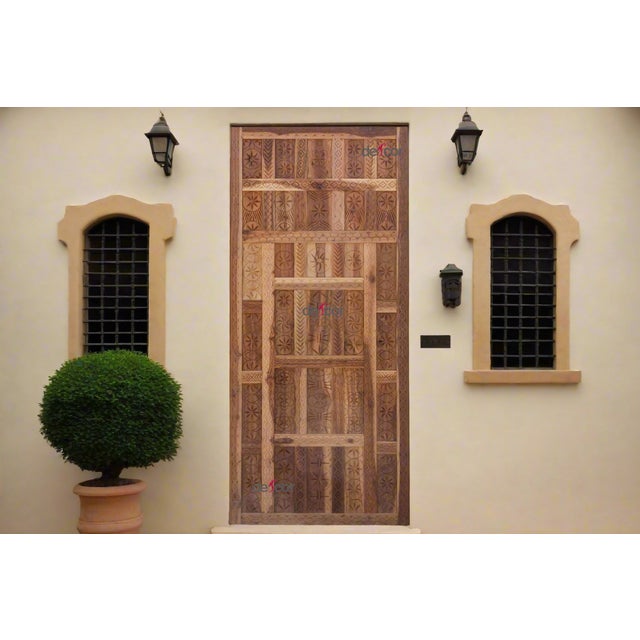 One-of-a-kind, this reconstructed Spanish Moorish style door features floral and geometric carved motif originally found...