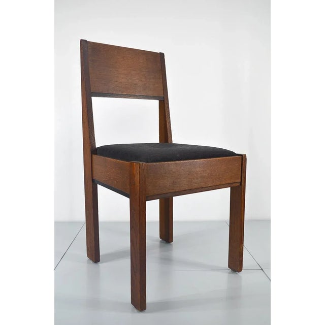 This slatted chair in a constructivist style features black-stained details and new horsehair upholstery. This piece has...