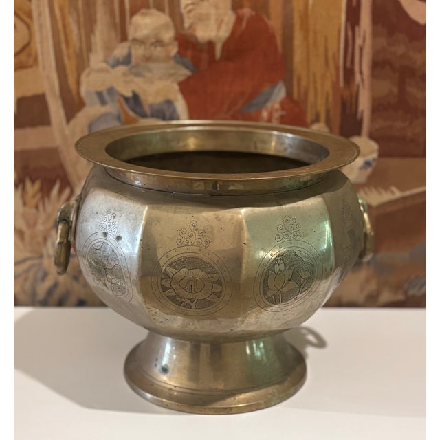 Antique hand-worked brass 10-sided jardiniere with engraved and stippled designs along the rim and body depicting a fish,...