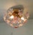 Add an elegant and romantic touch to your space with this pink Murano style flower flush mount ceiling light. The glass...