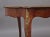 A superb quality 19th Century walnut and inlaid centre table, the shaped top profusely inlaid with various decorative...