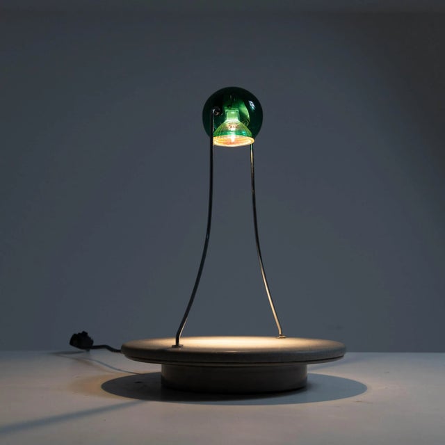Table lamp model “Gemma”, small size, manufactured by Skipper. Granite base and green coloured acrylic glass diffuser....