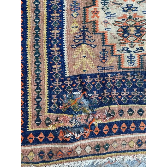 Very beautiful early 20th century long distressed Kilim with a beautiful geometrical stylized design and nice colors,...