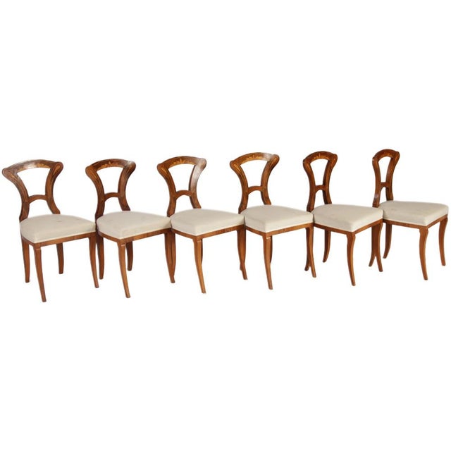 Age and Origin: The chair is likely from around 1825-1835 and is likely from Vienna, Austria. Dimensions: Height approx....