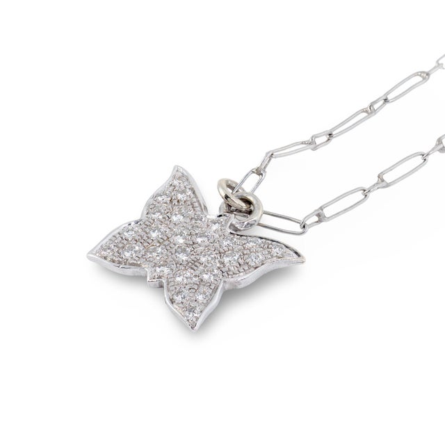 This charming vintage butterfly necklace is a delicate yet meaningful expression of fine diamond jewelry, beautifully...