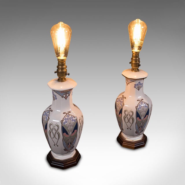 This is a pair of vintage Liberty of London table map bases. An English, ceramic decorative accent light with Ianthe...