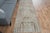 This vintage hand-knotted area rug is a semi-antique vintage area rug. The '70s Eastern region of Anatolian's unique rug...