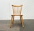 Two rare mid-century rung chairs from Casala. A classic Windsor chair design in Scandinavian style. This is evident in the...