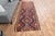 Vintage Hand-Knotted runner rug is a semi-antique vintage area rug. The '70s Eastern region of Anatolia's unique rug is...