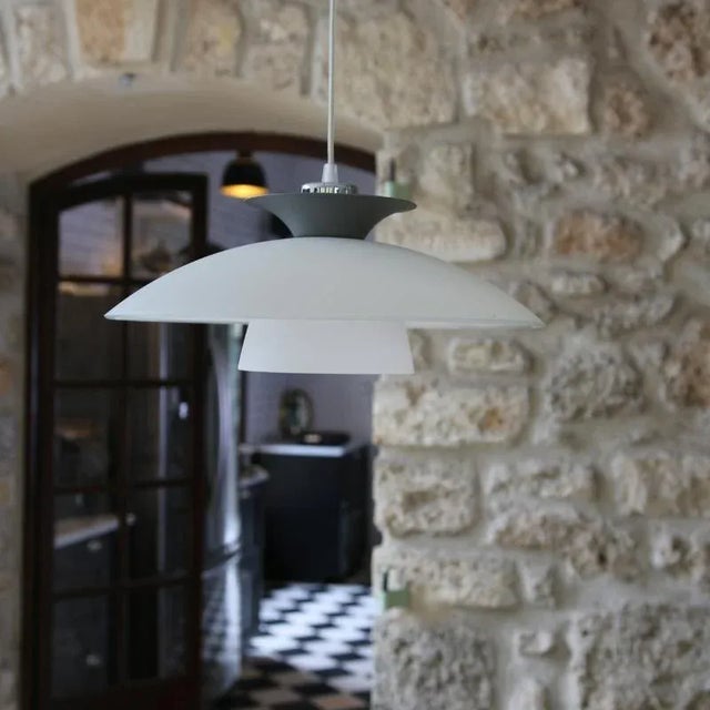 Pretty Scandinavian pendant light from the Swedish brand Belid, dating from the 1990s. Slender, sober, elegant, it...