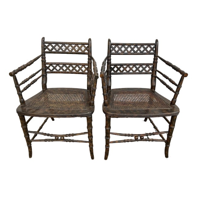 Pair of Regency Style Faux-Bamboo Faux-Painted Caned Seat Arm Chairs by Baker Furniture. For Sale