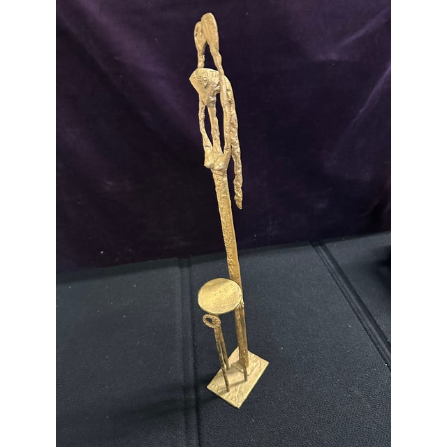 Expressionist sculpture, perhaps goddess Demeter, Greek writing on the base and bottom. "He made it for the benefit of the...