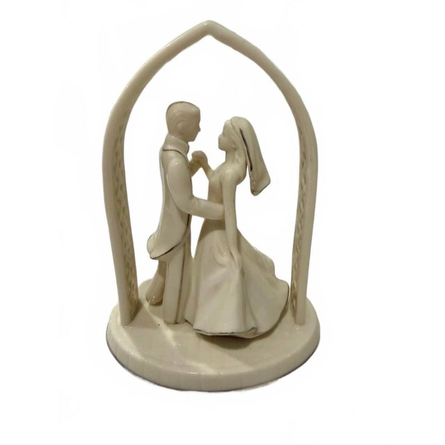 Add a classic heirloom piece to a curated display case, tabletop, or upcoming wedding celebration. This fine ivory...