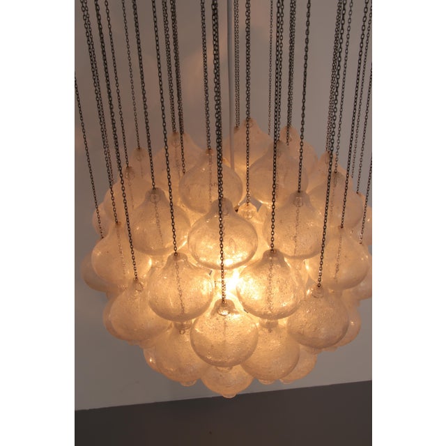 Vintage tulipan pendant light in blown glass by j. T. Kalmar, 1970, in flawless conditions. designed 1970 to 1979 this...