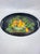 Bring an elegant touch to your tabletop or wall display with this striking vintage oval serving tray. Crafted of wood with...