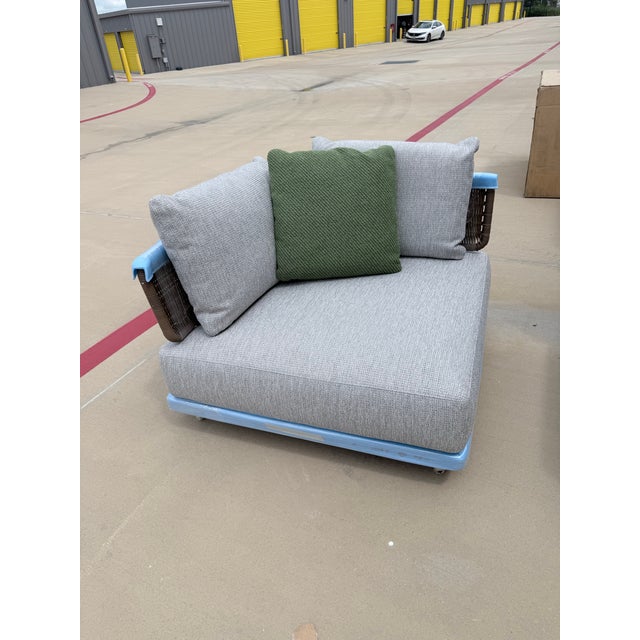 Minotti “Quadrado” Outdoor Corner Element – Left – Fango / Grenada Titanio A refined modular seating component from...