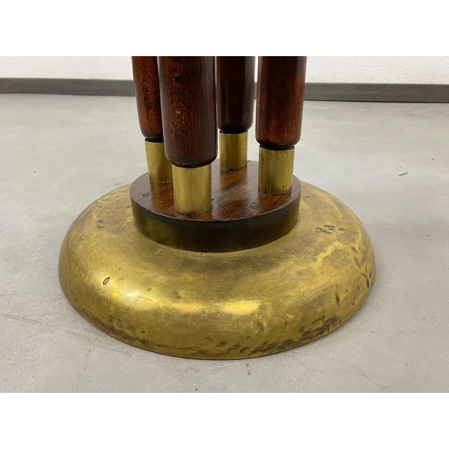 Secession plant stand with brass fittings.