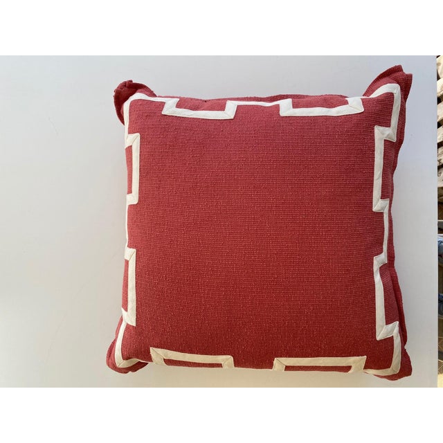 Custom made pillow crafted of Kravet coral pink linen. Embellished with inset fretwork banding and flange. A perfect pop...