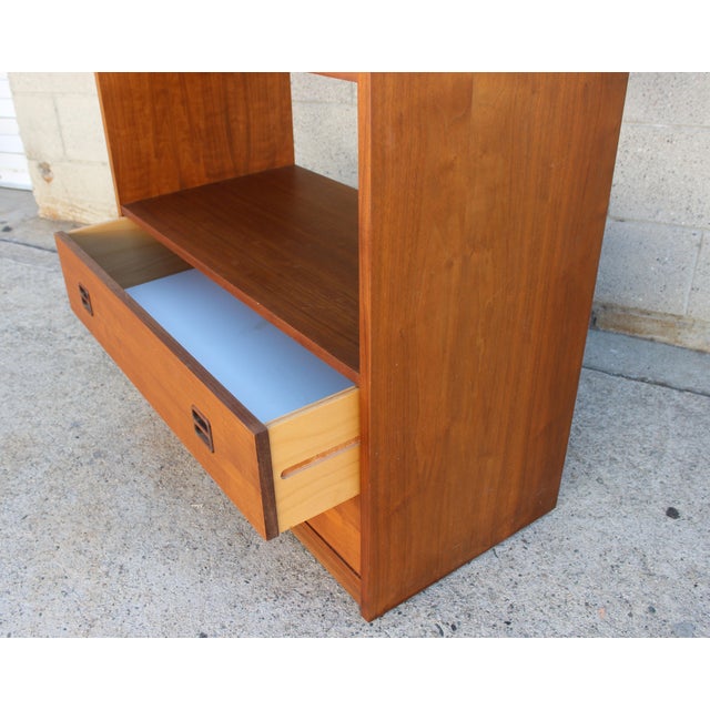 Bring timeless Danish design into your room with this stunning mid-century teak double sided bookcase / room divider. It...