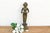 A monumental and stately ritual masterpiece featuring an imposing 14.5-inch silhouette, extensive incised jewelry...