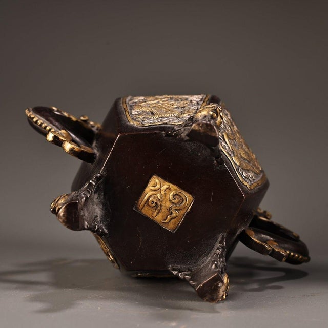 This stunning piece is masterfully crafted from heavy solid copper/bronze with a rich, dark patina. It features intricate...