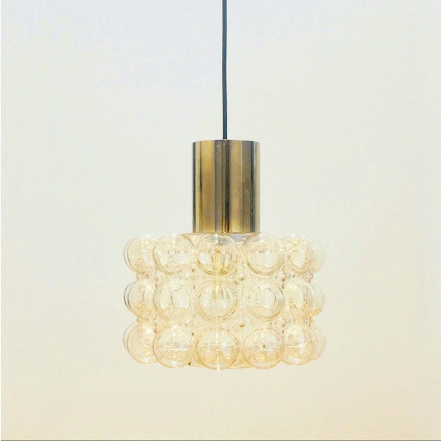Large round mid-century modern ceiling light designed by helena tynell for limburg (germany, 1960s). The light...