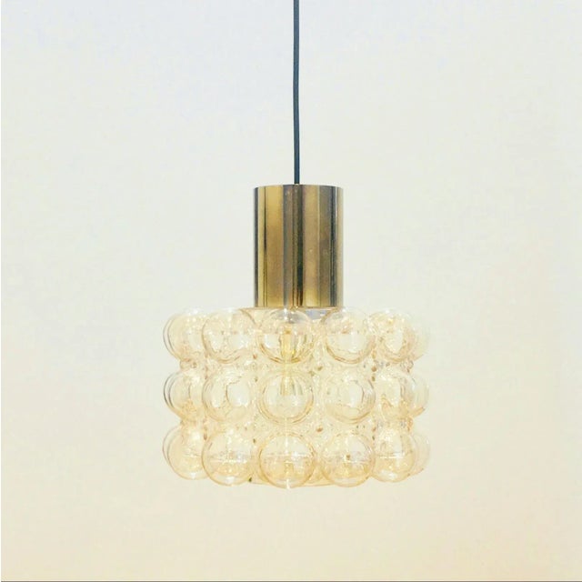 Large round mid-century modern ceiling light designed by helena tynell for limburg (germany, 1960s). The light...