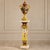 Make a dramatic statement with this ornate French-style porcelain vase and coordinating pedestal, designed as a single,...