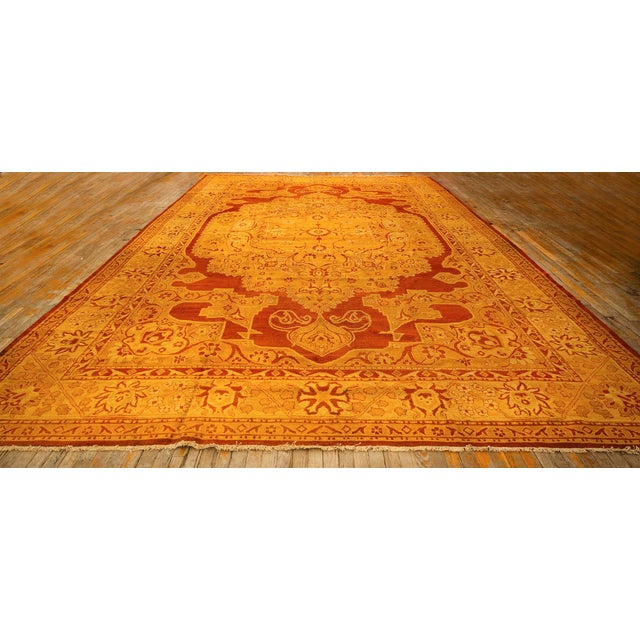"This magnificent Antique Indian Agra rug, dating to circa 1900, is a premier example of the sophisticated weaving...