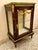 This elegant Louis XV-style marquetry bedside cabinet showcases refined French craftsmanship with a sophisticated blend of...