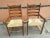 Pair of Mid Century Maple and Rush Seat Armchairs . Measures 21.5" in width, 21.5" in depth, 39.75" in height. Seat height...