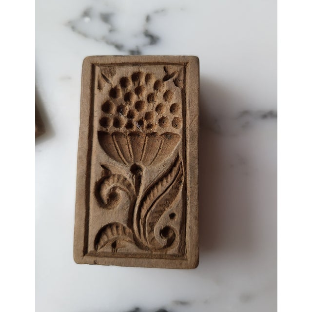 A fine collection of antique, one-of-a-kind wooden gingerbread moulds. Different sizes varying in length, width and depth,...