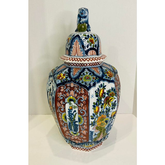 Statement pieces! Hand painted large ginger jar and pair of vases by Boch Delft of the Netherlands. Circa 1900. Rich hues...
