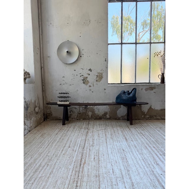 Vintage solid oak farmhouse bench from the 1950s. We love its rustic aesthetic, with its patinated old oak and its...