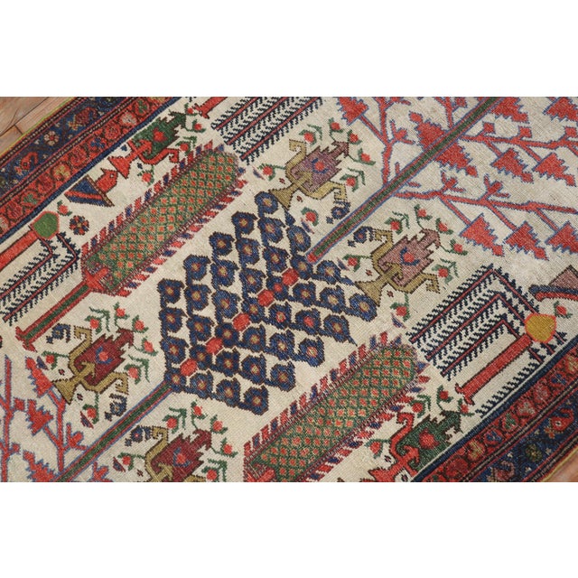 A 20th century tribal highly decorative Persian Malayer runner with a willow tree pattern on a ivory ground. Great quality...