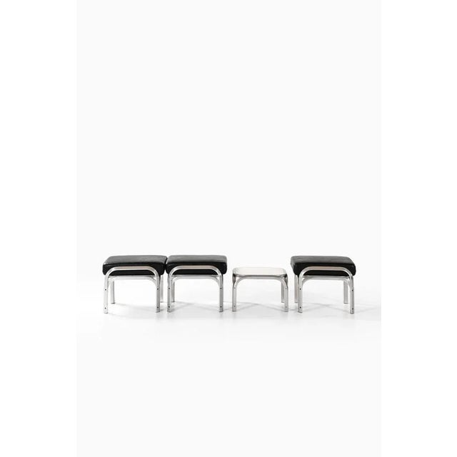 Very rare seating group consisting of 3 stools and table designed by jørn utzon. Produced by fritz hansen in denmark....