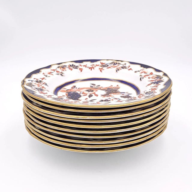 A set of ten Minton soup bowls, circa 1900. One bowl lightly cracked.