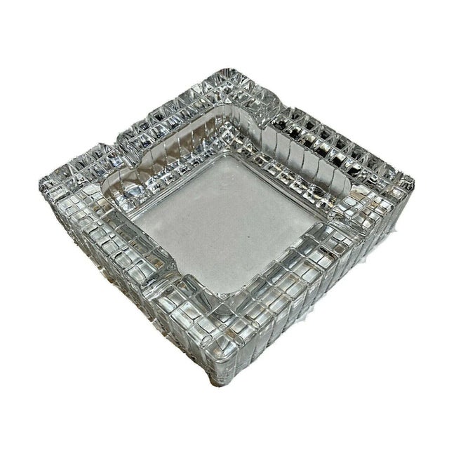 This contemporary Art Deco transparent ashtray will make a nice addition to any table setting. Sophisticated enough to be...