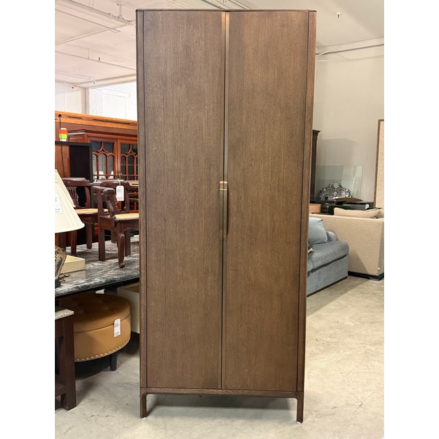 Design Plus Gallery presents the Padua Cabinet by Van Thiels from Restoration Hardware. The tall rectangular case is clad...