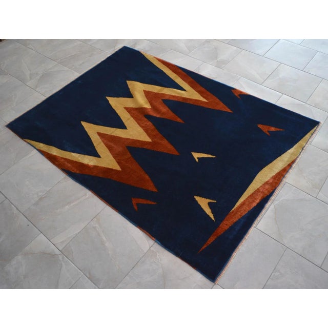 This colorful and contemporary vintage rug is truly a piece of art. Dimension: 57" x 79" Excluding fringe / 4 ft 9 in x 6...