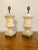 Gorgeous pair of Alabaster lidded urn lamps. Masterfully carved with amazing form. Aging gracefully resulting in beautiful...