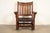 A gorgeous antique Mission or Arts & Crafts period V-back rocking chair By Gustav Stickley USA, Circa 1910 Solid quarter...