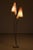 Wonderful organically shaped floor lamp with two polyester shades. The two lamps can be turned on and off separately. Has...
