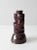 This vintage studio pottery vase features an expressive, free-form silhouette with a rich, dark reddish-brown glaze. Hand-...