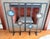 Striking vintage folding fireplace screen crafted from matte black iron with four polished natural agate stone insets in...