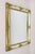 Decorative Italian gilt roccoco style wall mirror from the 1950s in Venice. A real eyecatching mirror from the mid century...
